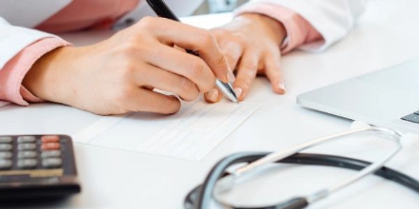 Healthcare professional at desk